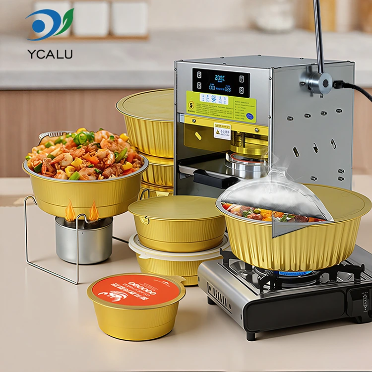 Manuaalinen kuumasaumauskone kultaisilla alumiinifoliosäiliöillä